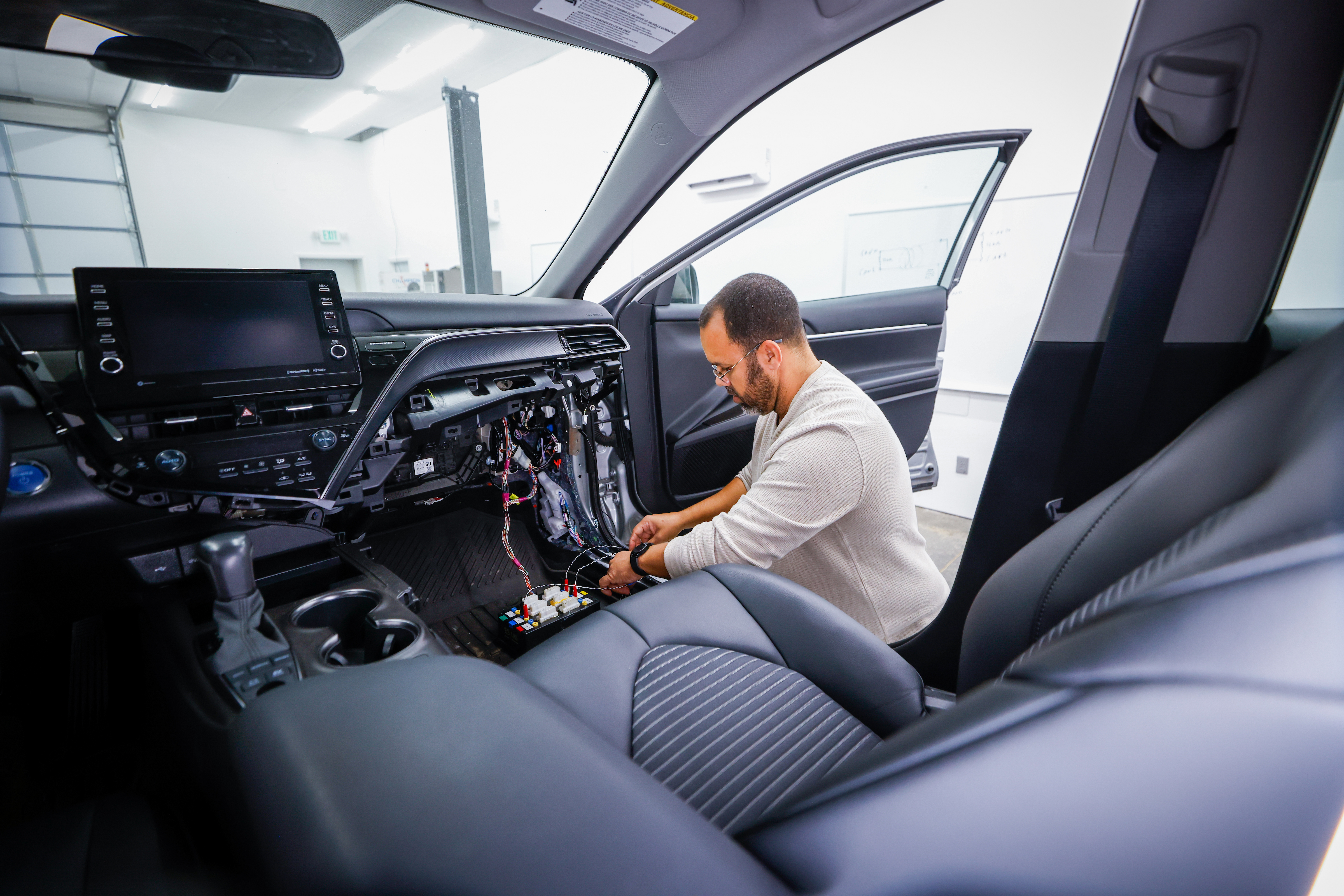 Student working on Car