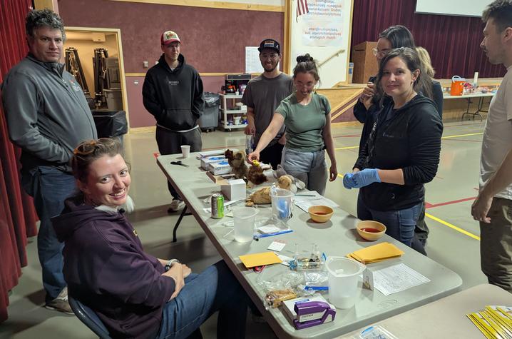 Berry, Bodin, and Anni Noble demonstrate the sampling process. Photo provided.