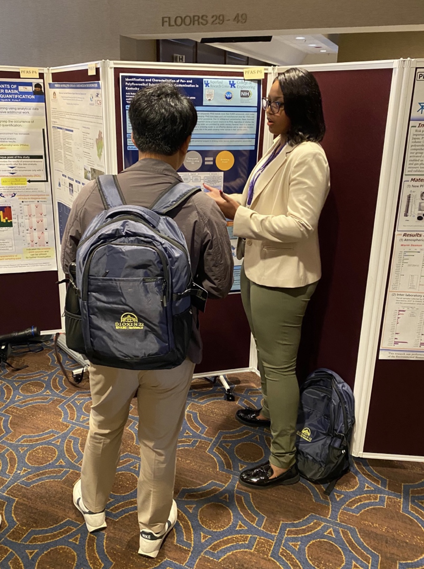Civil Engineering doctoral student Ariel Robinson presenting her poster to a conference attendee.  Her poster is entitled “Identification and Characterization of Per- and Polyfluoroalkyl Substance (PFAS) Contamination in Kentucky.”  Co-authors: Sweta Ojha