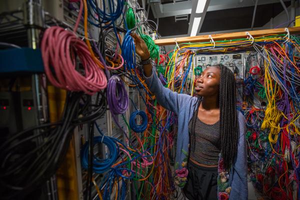 Female student in electrical engineering lab