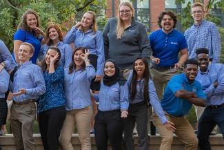 2018 group of ambassadors making funny faces and holding up the cat eye.