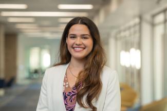 Professional headshot of Maria Menendez Morales.