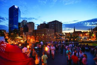 Lexington City Skyline with people being entertained