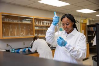 Student in Lab coat