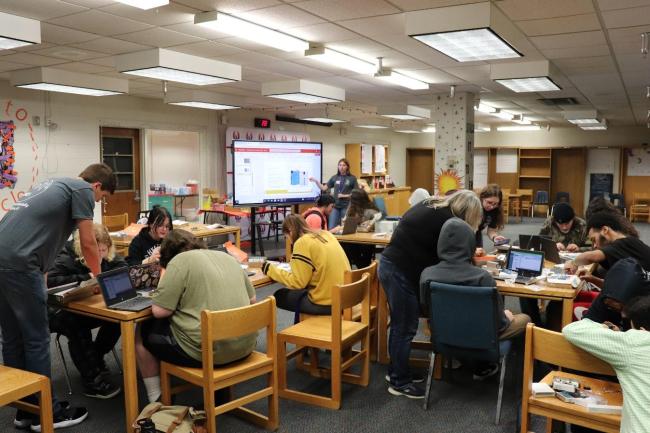 BMES members David Alexander, Alaa Jaloudi, Makenna Pelfrey, Madison Korfhage, Jessica Zibart, and Trisha Sullivan visited Phoenix Horizon Academy. BMES President, Trisha Sullivan, is guiding students through an Arduino board activity.