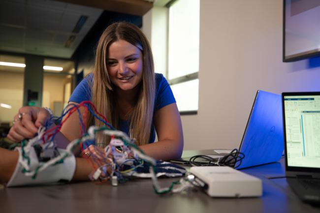 Madison Bates with her sensor glove.