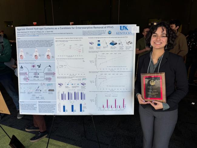 Ifrah Hammad alongside her research poster at Future Leaders in Chemical Engineering