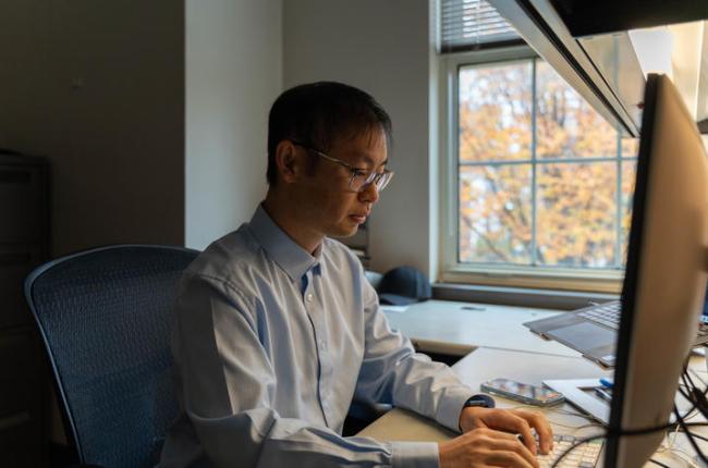 Xiao on computer in office 