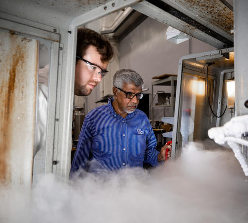 Professor I.S. Jawahir (right), conducting cryogenic material processing experiments with Daniel Caudill (left), Mechanical Engineering graduate research assistant. Pete Comparoni | UK Photo.