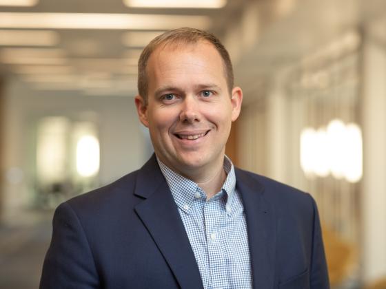Professional headshot of Andrew Jenkins.