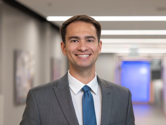 Professional headshot of angelo stedarkis.