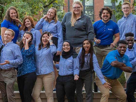 2018 group of ambassadors making funny faces and holding up the cat eye.