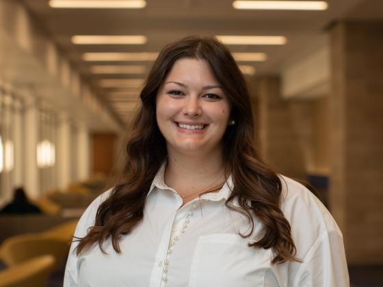 Professional headshot of Sydney Kolnsberg.