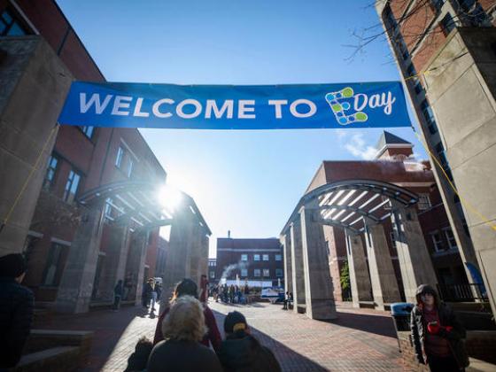 Welcome to E-day banner over the Engineering arches at the University of Kentucky.