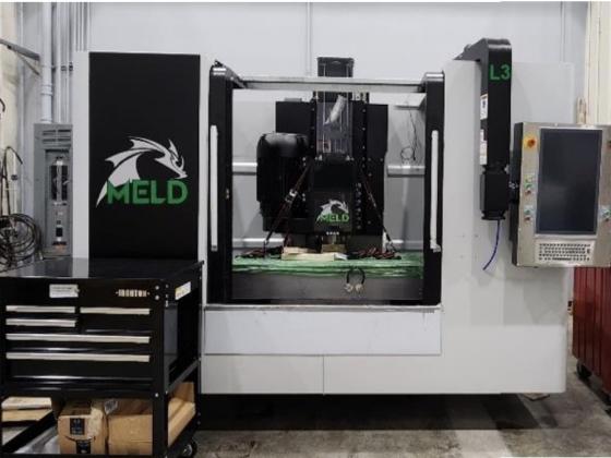 Additive Friction Stir Deposition (AFSD) meld machine.