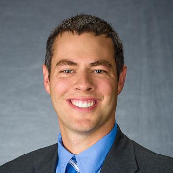 Professional headshot of Aaron Cramer.