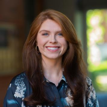 Professional headshot of Hannah Tyler.