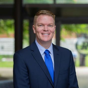 Professional headshot of Tony Jackson.